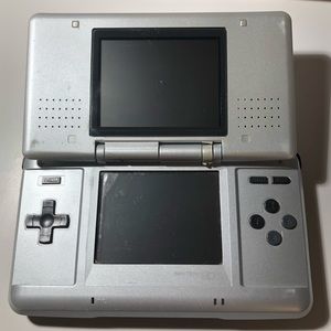 Nintendo DS (broken right hinge) with charger and stylus